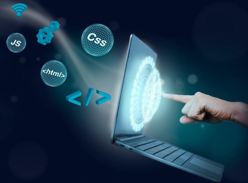 A laptop surrounded by JS, CSS and HTML icons, representing front-end development